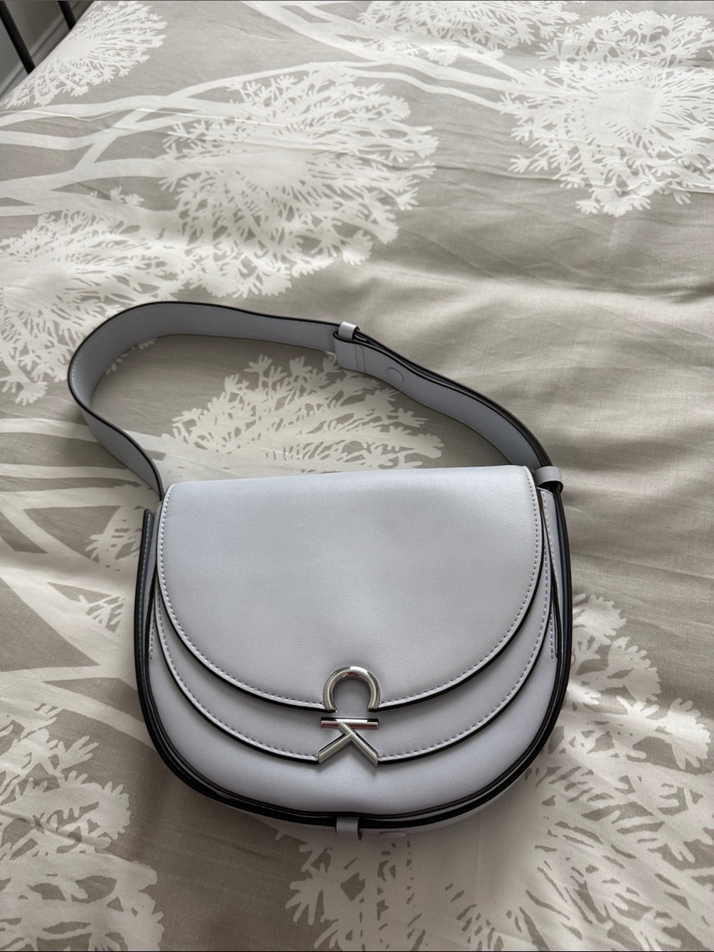 Calvin Klein Light Gray Saddle Crossbody with Silver Hardware
